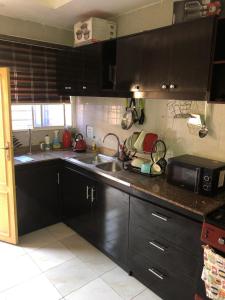 Кухня или мини-кухня в 3 Bedroom Bungalow at Heliu Estate, Enugu
