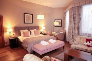 a hotel room with a bed and a living room at Tigerlily in Edinburgh