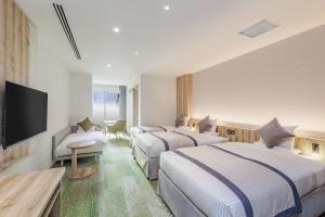 Postel nebo postele na pokoji v ubytování KAMENOI HOTEL Nagatoro Yorii