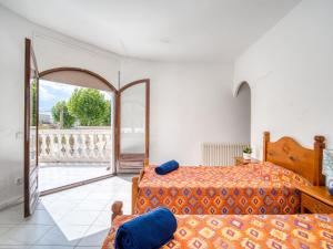Posteľ alebo postele v izbe v ubytovaní Holiday Home Paquita by Interhome