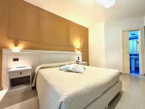 Postel nebo postele na pokoji v ubytování Albanuova Hotel