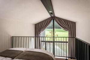 Såndgøld Alpine Glamping客房内的一张或多张床位