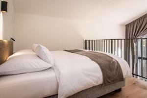 Såndgøld Alpine Glamping客房内的一张或多张床位