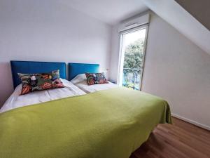 Ένα ή περισσότερα κρεβάτια σε δωμάτιο στο Apartment Les Demeures du Parc by Interhome