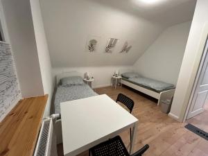 Postel nebo postele na pokoji v ubytování Rosengarten + 9 fotografií