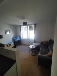 Posezení v ubytování Stevenson Apartment in Oban City