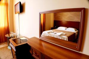 Letto o letti in una camera di Hotel Condori