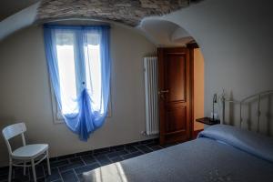 A bed or beds in a room at U Campanin