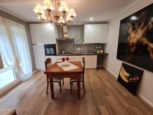 Kuchyň nebo kuchyňský kout v ubytování B&B Regina