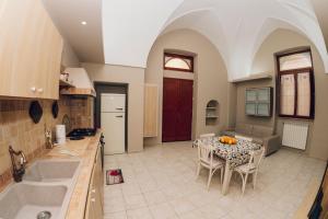 Η κουζίνα ή μικρή κουζίνα στο Casa vacanze Cittadella Nuova