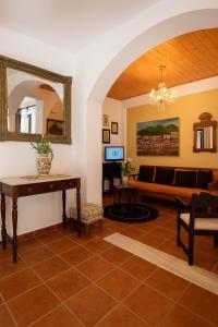 Televízia a/alebo spoločenská miestnosť v ubytovaní Cretan Magnolia Gem - Smari Cozy Getaway