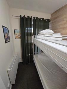 Postel nebo postele na pokoji v ubytování Rooms4Rest Skibicka - Private rooms for tourists - ATR Consulting Sp, z o,o,