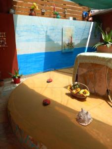 a play area with a table with a tableablishthritisthritisthritisthritisthritisthritis at Vila Gjoka in Himare