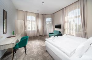 Postel nebo postele na pokoji v ubytování Esplanade, dependance hotelu Monti Spa + 37 fotografií