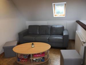 Posezení v ubytování Ferienwohnung Haus Am Wasser In Emden