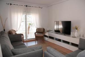 Posezení v ubytování Ferienhaus Villa 3 A Mit Privatem Pool + 31 fotografií