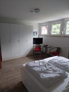 Postel nebo postele na pokoji v ubytování Ferienhaus Möwe 16