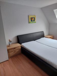 Postel nebo postele na pokoji v ubytování Ferienhaus Möwe 16