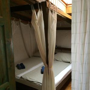 a couple of bunk beds in a room at Sommersprosse Terase in Betina