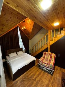 Postel nebo postele na pokoji v ubytování Quba Uğur Hotel