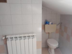 Koupelna v ubytování Casa di Via Roma + 15 fotografií