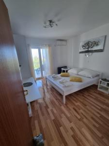 Postel nebo postele na pokoji v ubytování Rab - Apartman Matea