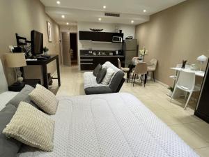 Posezení v ubytování Loft de Lujo en Condominio de Bahia Grande Nordelta