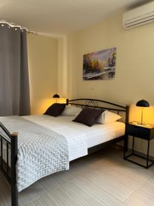 Postel nebo postele na pokoji v ubytování Apartments Villa Dinka
