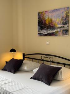 Postel nebo postele na pokoji v ubytování Apartments Villa Dinka