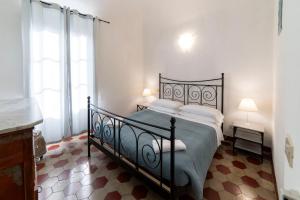 Letto o letti in una camera di Ca di Ni