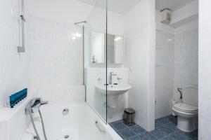 Kúpeľňa v ubytovaní Bliss Apartment + 17 fotografií