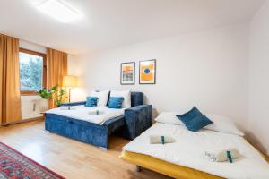 Posteľ alebo postele v izbe v ubytovaní Bliss Apartment