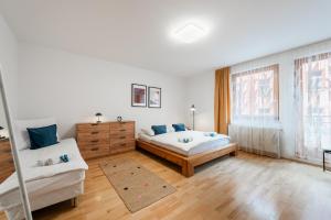 Posteľ alebo postele v izbe v ubytovaní Bliss Apartment