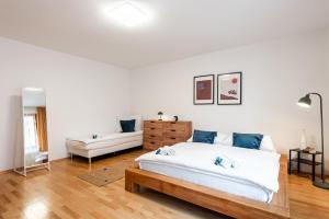 Posteľ alebo postele v izbe v ubytovaní Bliss Apartment