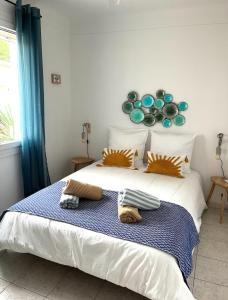Postel nebo postele na pokoji v ubytování VILLA LES SALINES Maison de Vacances au Grau du Roi