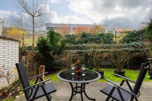 Vonkajšia záhrada v ubytovaní Bliss Apartment