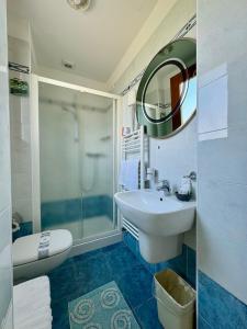 Koupelna v ubytování Hotel Fortuna