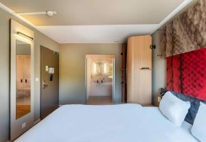 Postel nebo postele na pokoji v ubytování B&B HOTEL Rothrist Olten