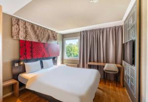 Postel nebo postele na pokoji v ubytování B&B HOTEL Rothrist Olten