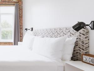Postel nebo postele na pokoji v ubytování Hotel Hive