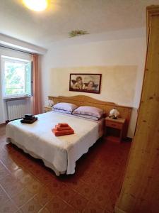 Ένα ή περισσότερα κρεβάτια σε δωμάτιο στο Agriturismo Ca' Castellani