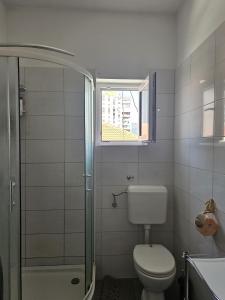 Koupelna v ubytování Rooms kman + 5 fotografií