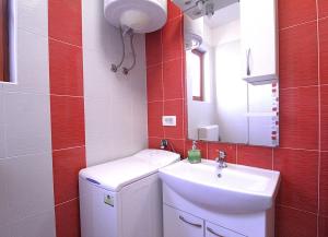 Koupelna v ubytování Apartments Mima