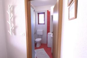 Koupelna v ubytování Apartments Mima