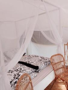 Tempat tidur dalam kamar di Zew Natury