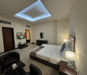 TV a/nebo společenská místnost v ubytování A Line Hotel