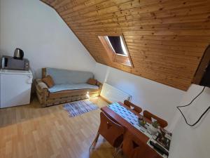 Kuchyň nebo kuchyňský kout v ubytování Apartman & Sobe Orhideja