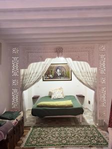 Ліжко або ліжка в номері Suite Iskander Persane
