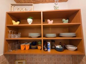 Kuchyň nebo kuchyňský kout v ubytování Apartman & Sobe Orhideja