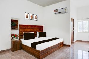 Postel nebo postele na pokoji v ubytování HOTEL O RAJENDRA PALACE + 21 fotografií